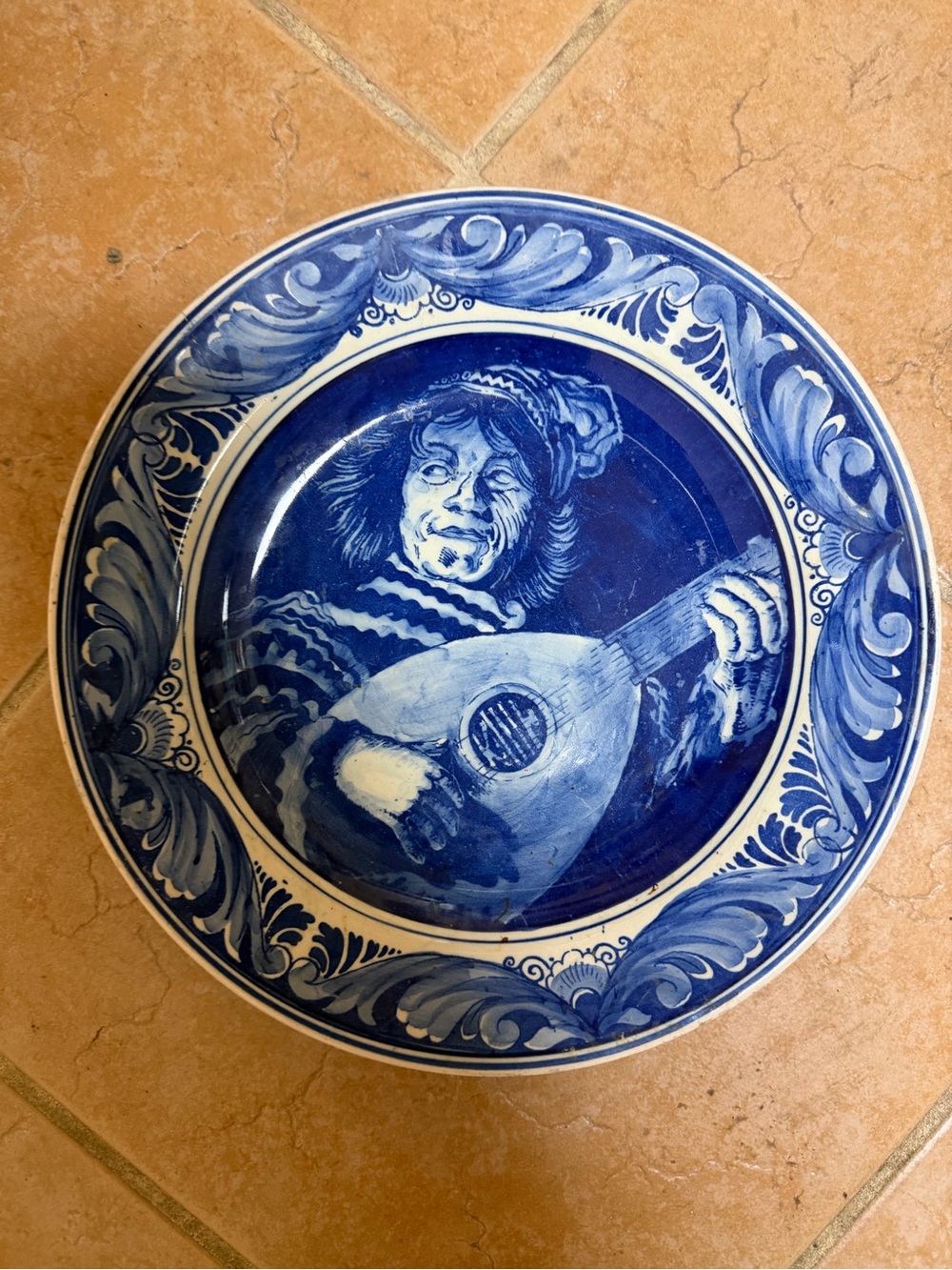 Hand-Painted Blue Ceramic Wall Plate with Musician Motif
